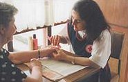 Lady giving a manicure
